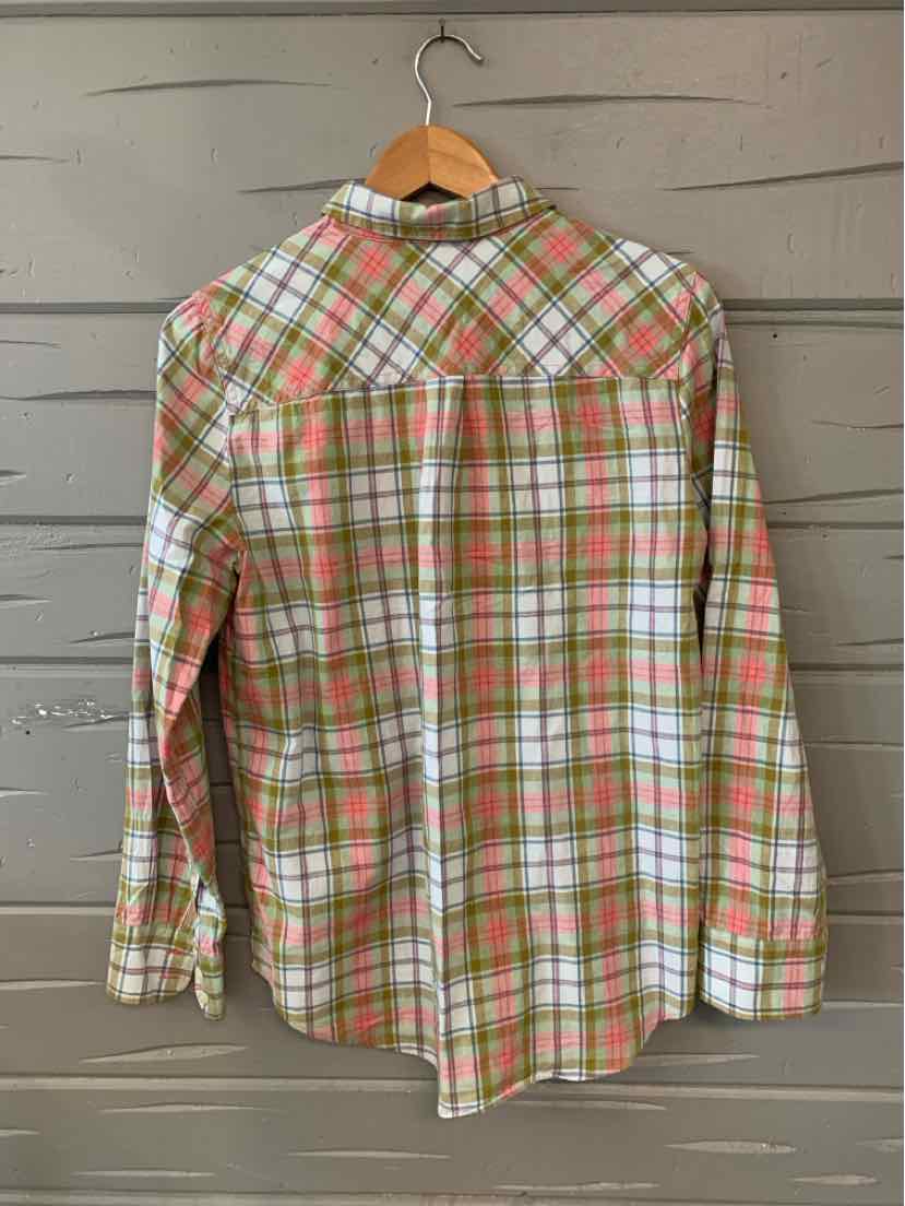 Green and white plaid button-up shirt with long sleeves hanging on wooden hanger.