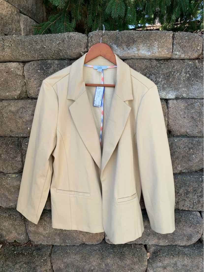 Tan blazer with notch lapels, long sleeves, front pockets, and single-breasted design.
