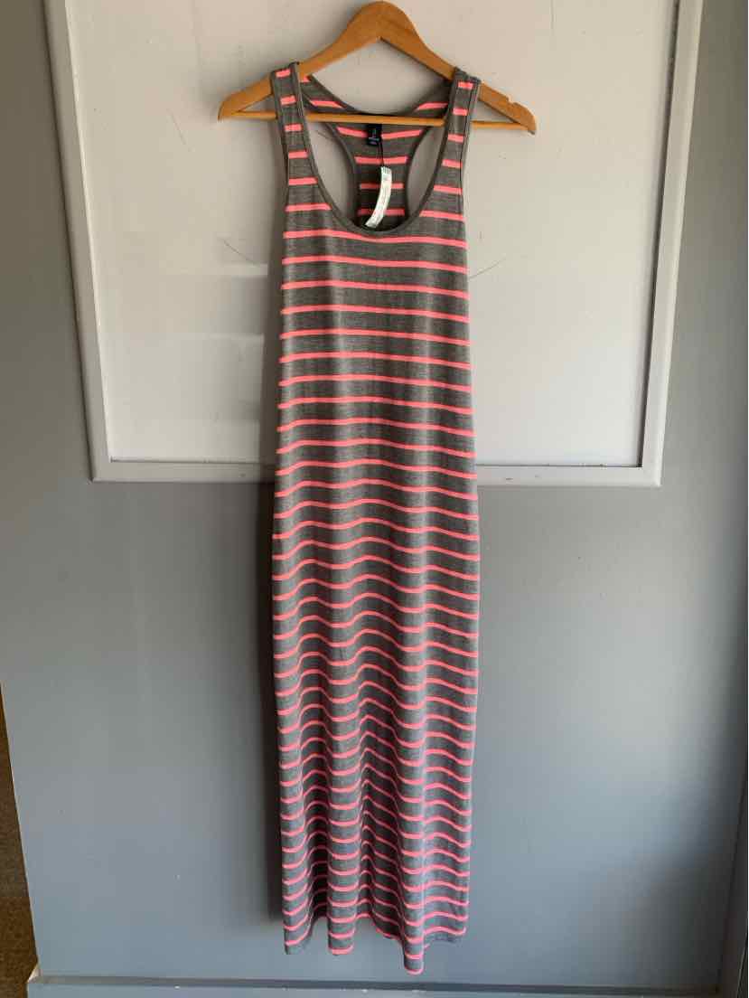 Gray and light coral striped sleeveless maxi dress with racerback hanging on wooden hanger.