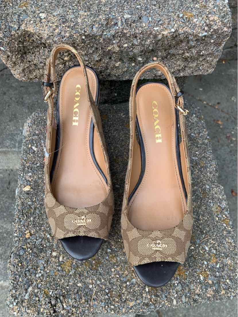 Women's size 7.5 Coach slingback shoes with brown monogram canvas and black peep-toe detail.