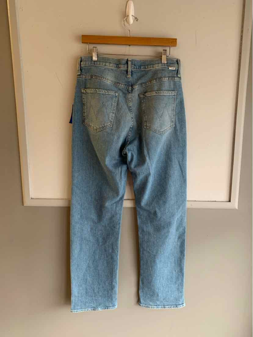 Light blue denim jeans in size 4 with classic five-pocket design and straight leg cut hanging on wooden hanger.
