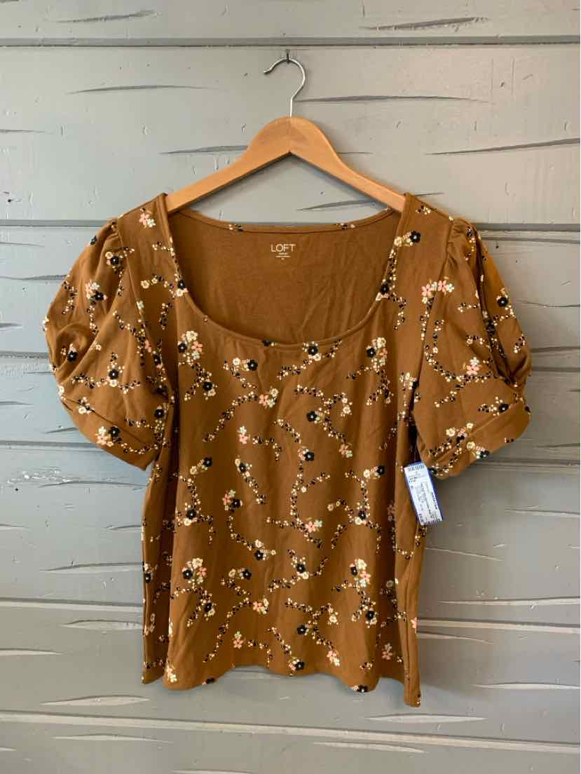 Tan floral blouse with puff sleeves and scoop neckline in size XL.
