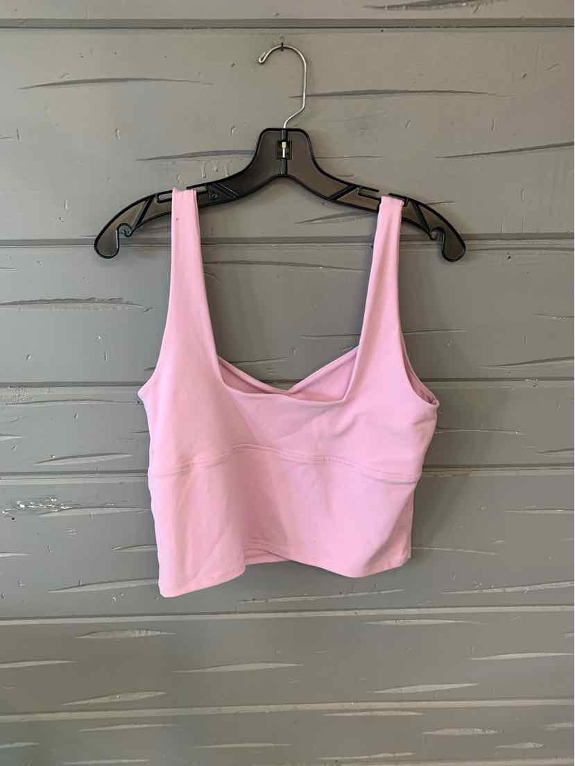 Light pink cropped tank top with wide straps and a scoop neckline, size large.