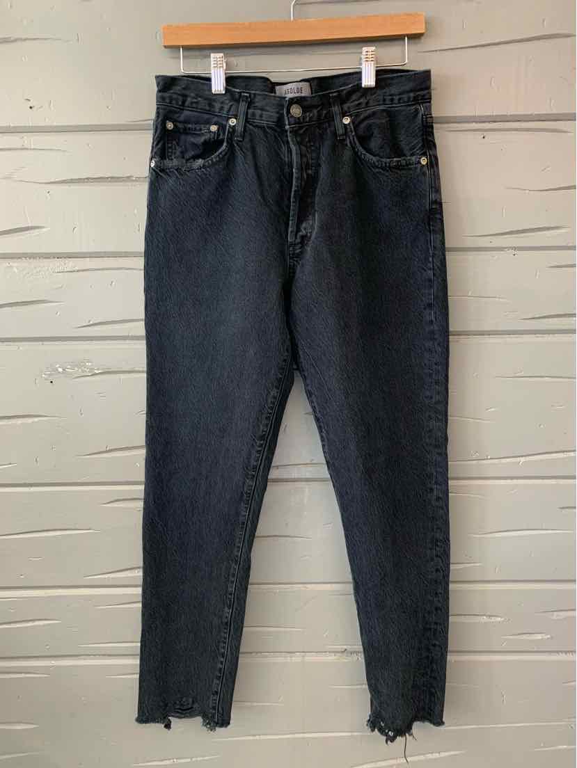 Black high-waist denim jeans with frayed hems, five-pocket design, and button closure, size 6.
