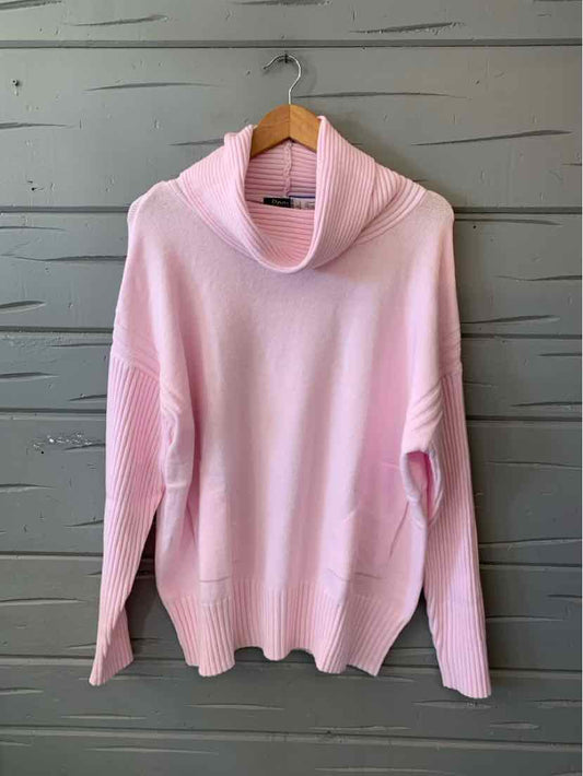 Light pink knit hoodie with a soft cowl neck, long sleeves, ribbed cuffs and hem, and a front kangaroo pocket.