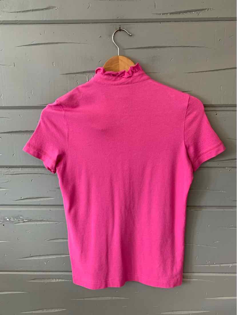 Bright pink short-sleeve top with ruffled mock neck, slim fit, smooth fabric.
