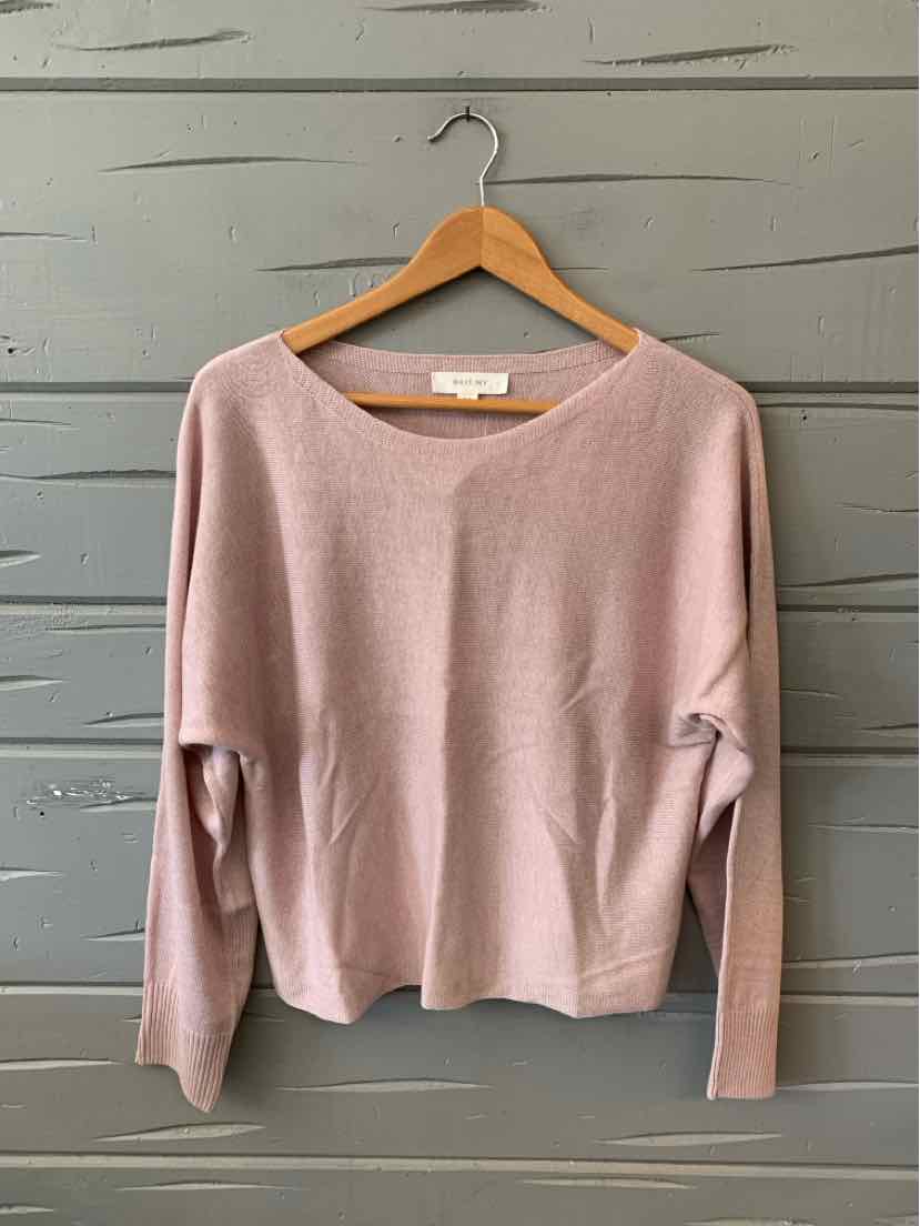 Mauve knit sweater with long sleeves and wide neckline, medium size on wooden hanger.