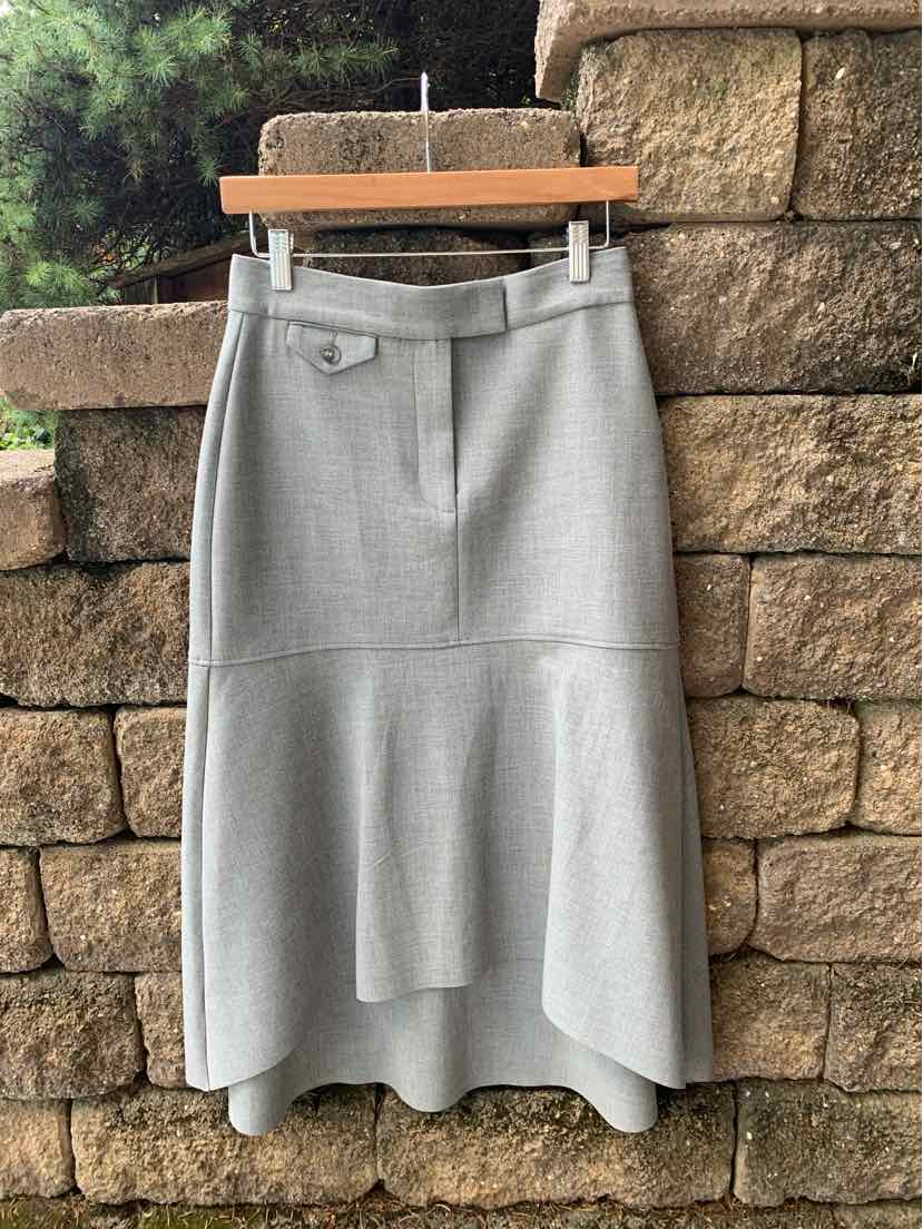 Light gray high-low skirt with asymmetrical hem and belt detail, size 4.