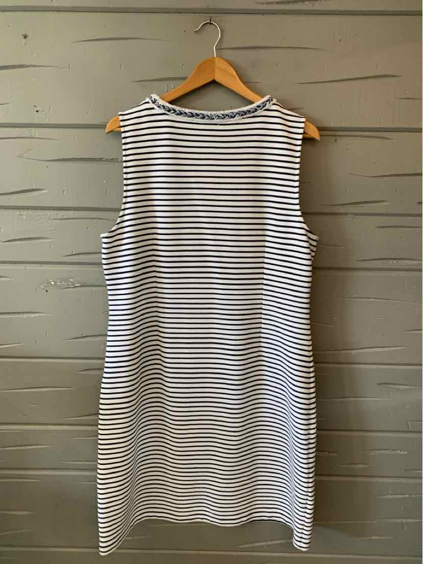 Sleeveless white dress with thin horizontal black stripes and a round neckline.