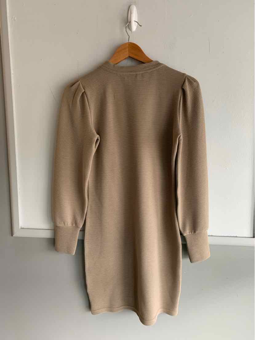 Tan long-sleeve knit dress with puffed shoulders and fitted cuffs, short length.