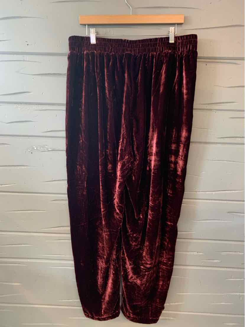 Burgundy velvet jogger pants with elastic waistband and cuffed ankles, size 18P.