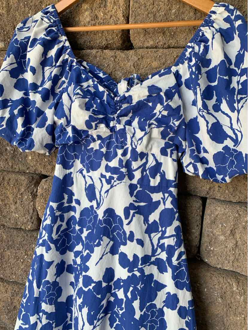 Blue and white floral puff sleeve dress with square neckline in size XS.