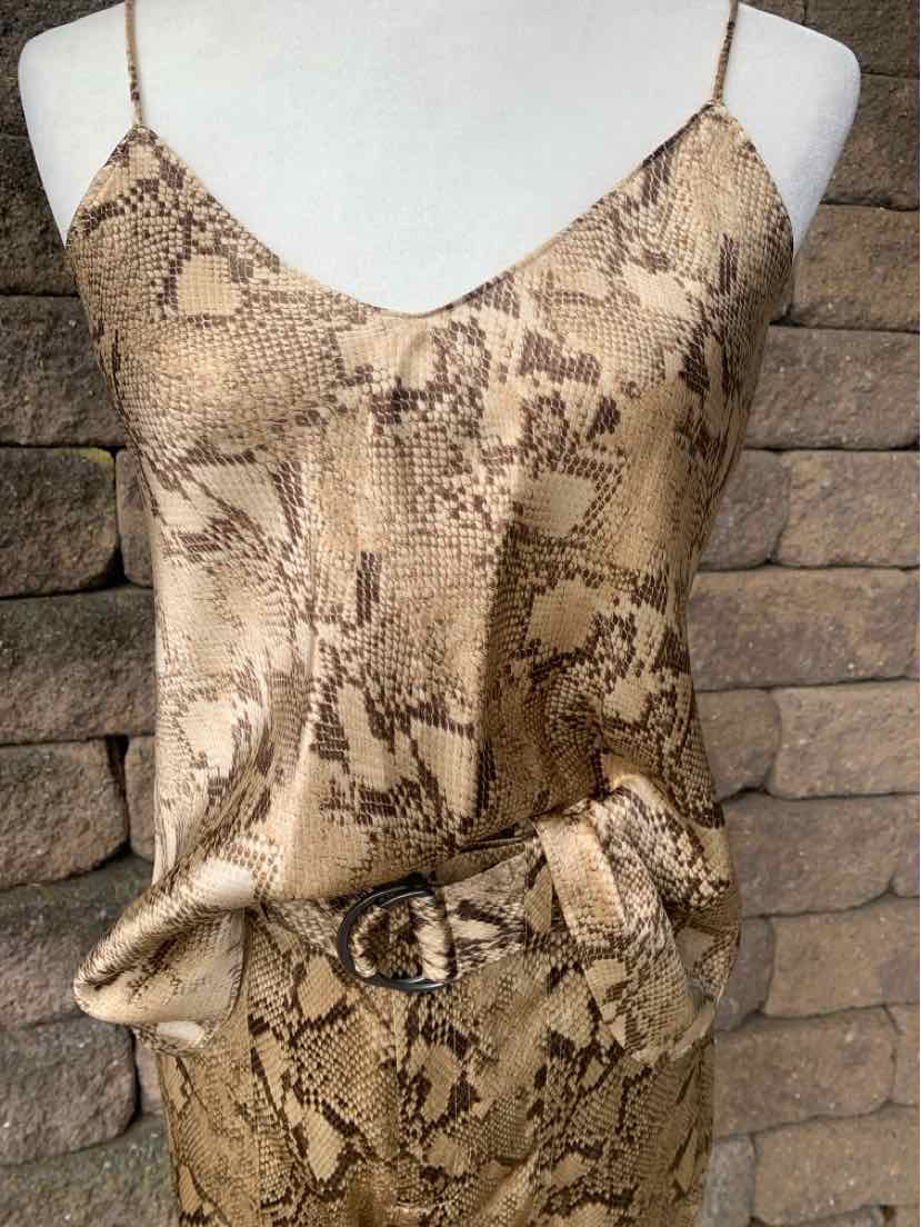 Satin snake print camisole with thin straps and matching belted high-waist skirt in beige and brown tones.