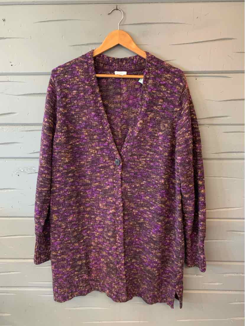 Purple knit cardigan with multicolor flecks, long sleeves, and loose fit on wooden hanger.