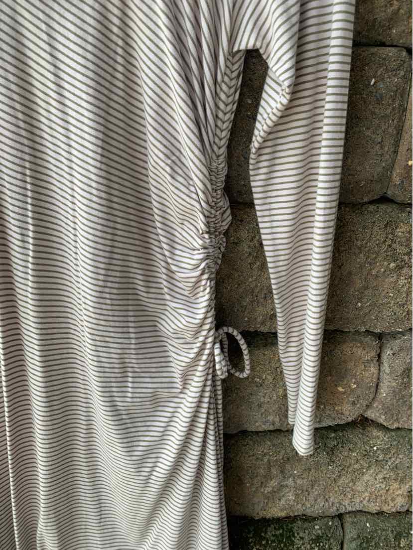 Mauve and white striped long-sleeve dress with ruched side tie detail and slim fit.
