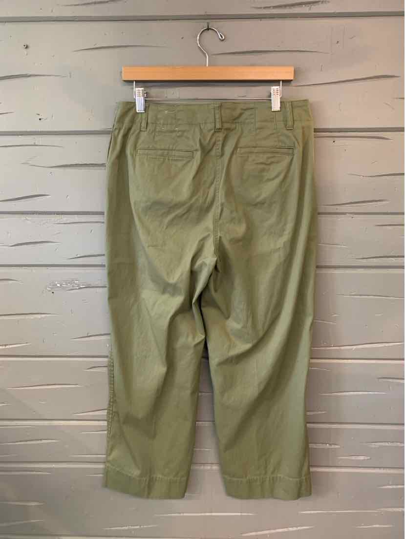 Olive green cropped pants with back pockets and belt loops, relaxed fit, size 10P.