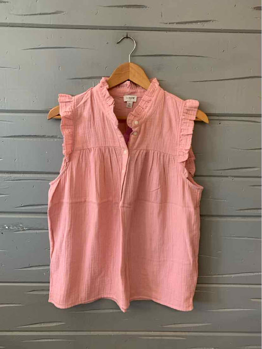 Sleeveless pink blouse with ruffled collar and buttoned front, medium size.