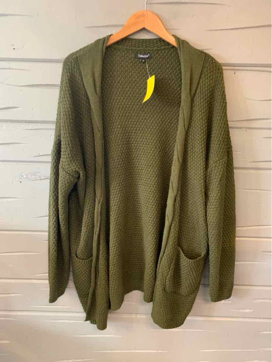 Olive green open-front knit cardigan with long sleeves and front pockets on wooden hanger.