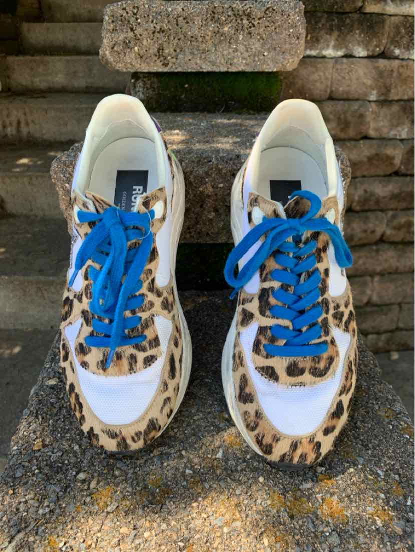 White and leopard print sneakers with bright blue laces and suede accents, size 37.
