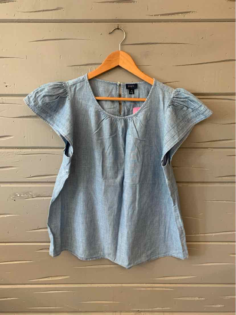 Light blue chambray blouse with puffed short sleeves and round neckline, medium size, lightweight cotton fabric.