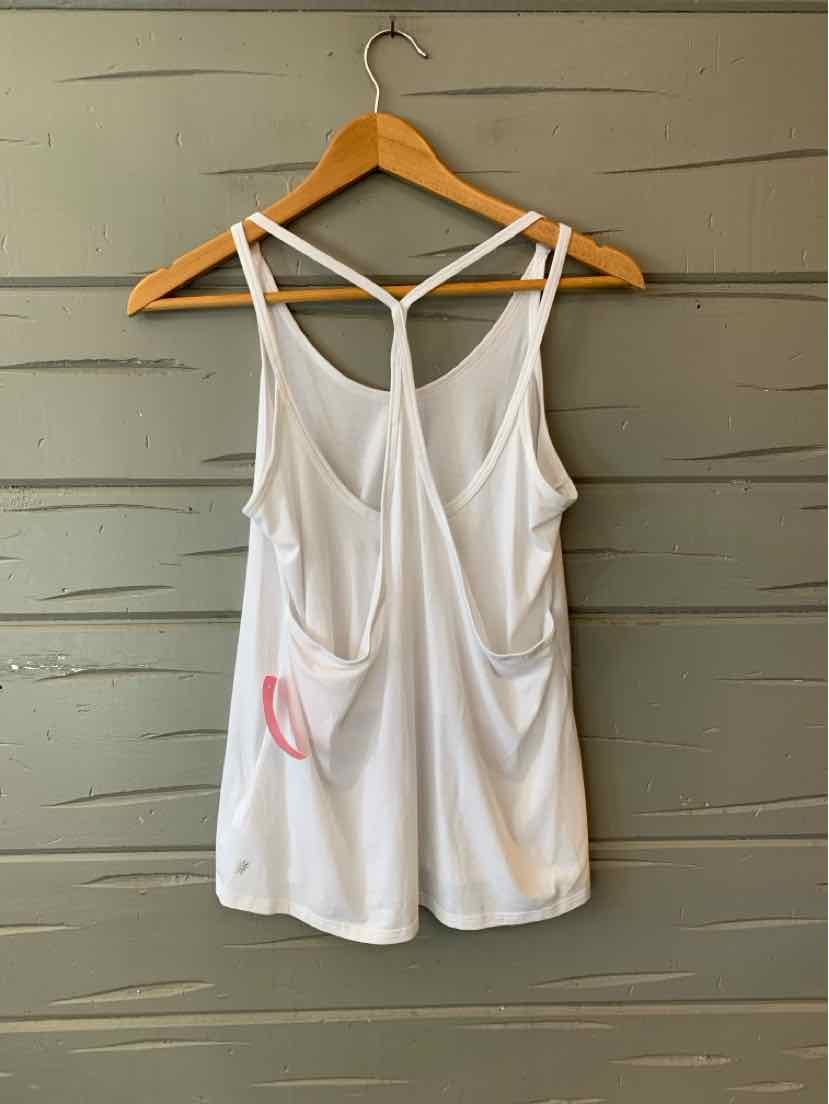 White sleeveless athletic tank top with thin crisscross straps and a small pocket detail on the back.
