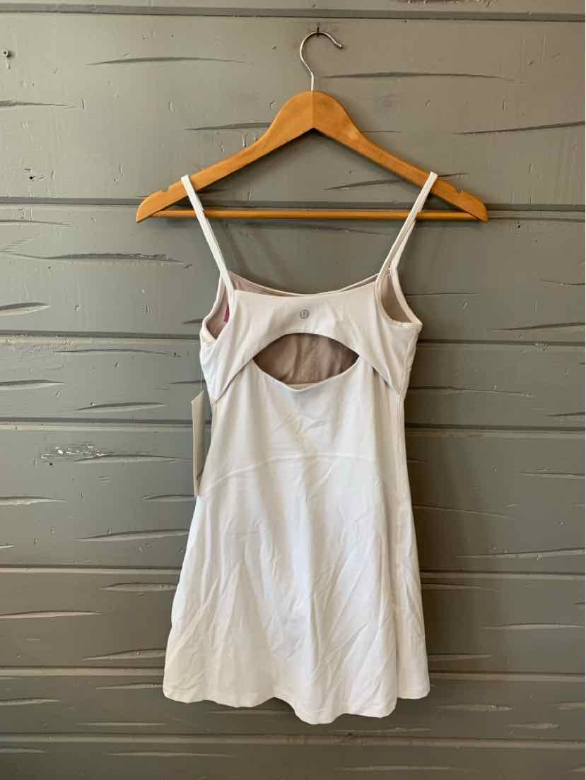 White Lululemon sleeveless dress with thin straps and front cutout detail, size 2.