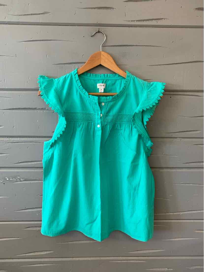 Teal sleeveless blouse with ruffled cap sleeves and keyhole neckline on wooden hanger.