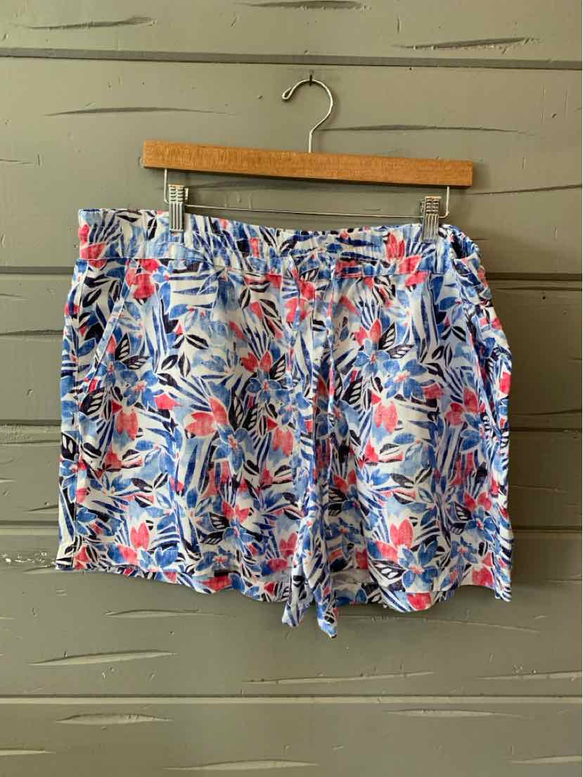 Men’s XL Tommy Bahama shorts with blue, red, and white tropical leaf pattern and drawstring waist.