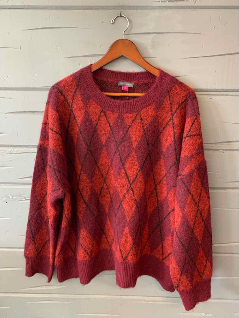 Red Vince Camuto sweater with a dark argyle diamond pattern, long sleeves, and a round neckline.