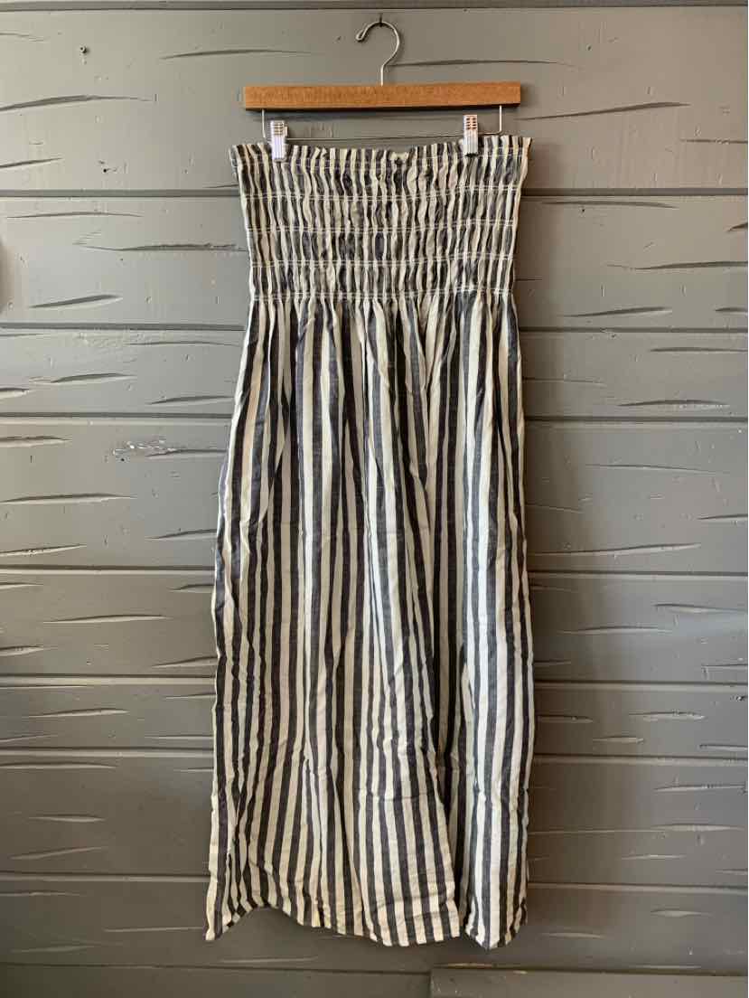 Gray and white vertical striped midi skirt with smocked elastic waistband, lightweight fabric.