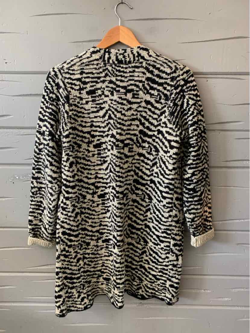 Black and white zebra print long-sleeve tunic with round neckline, size small.