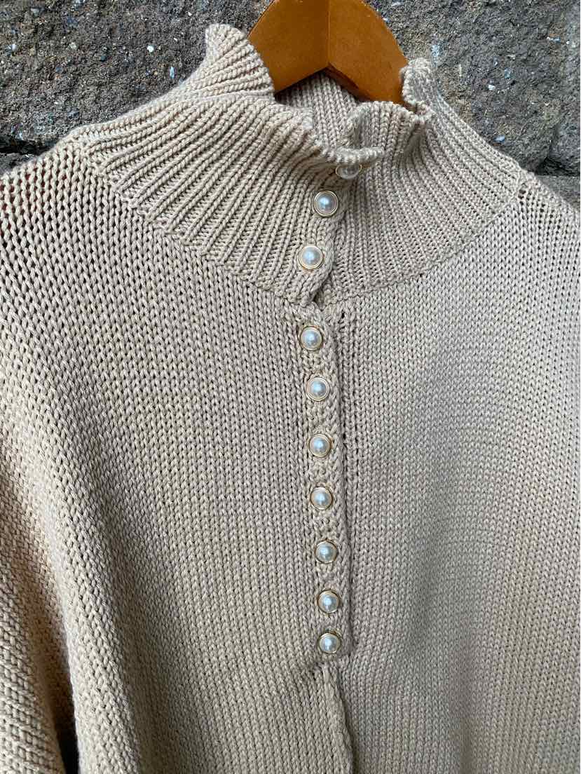 Tan knit sweater with high ribbed collar and buttoned front placket in size large.