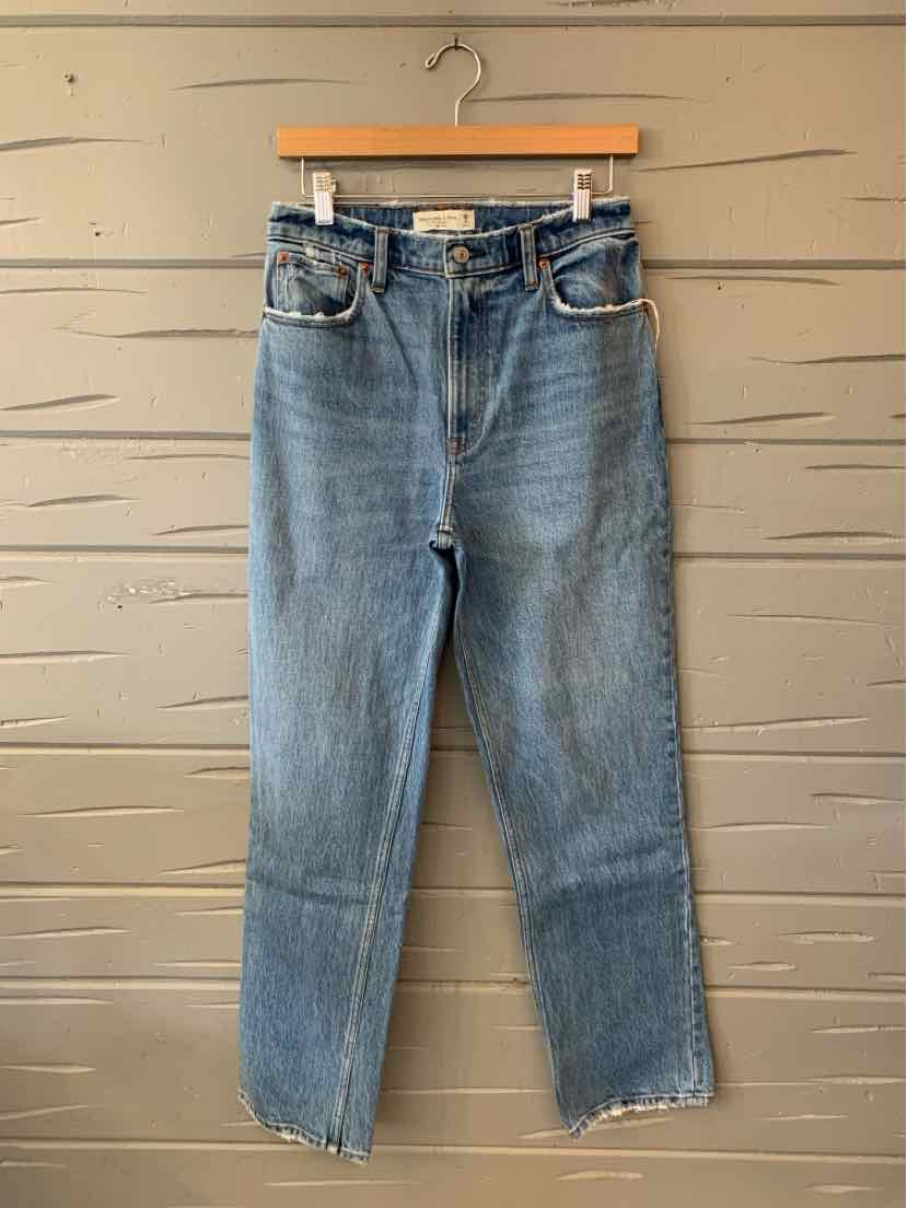 Women’s medium-wash blue denim jeans with a straight-leg cut, faded whiskering, and a classic five-pocket design.