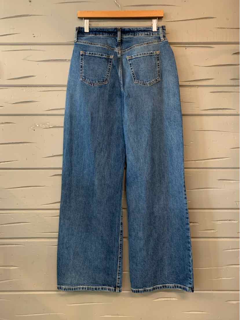 Women’s blue denim wide-leg jeans with a high waist, belt loops, and five-pocket styling.