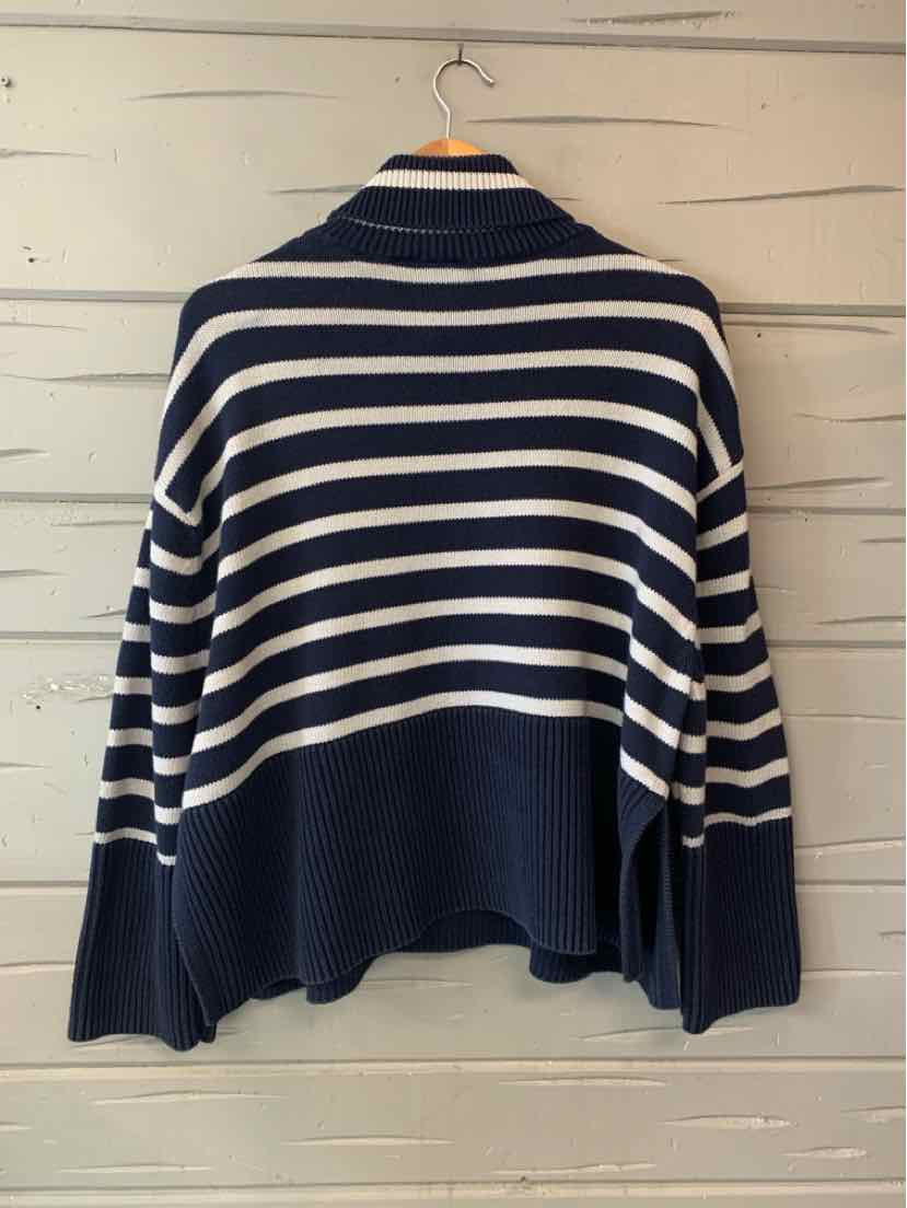 Navy GAP long-sleeve sweater with cream horizontal stripes and a relaxed fit.