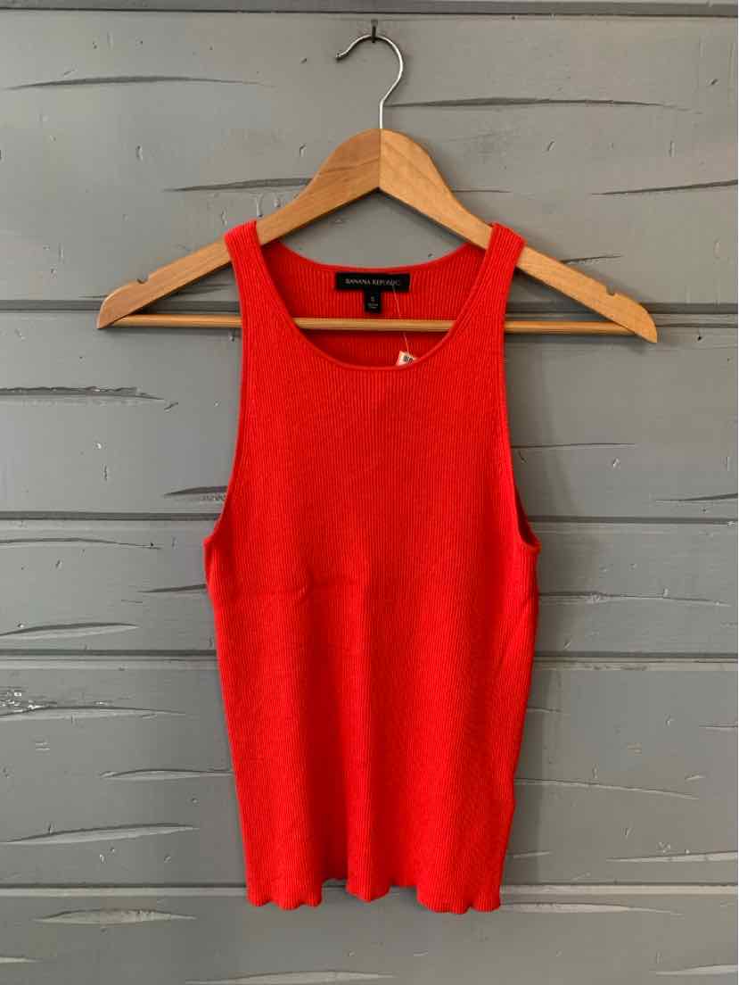 Red sleeveless ribbed knit tank top with crew neckline and fitted silhouette on wooden hanger.