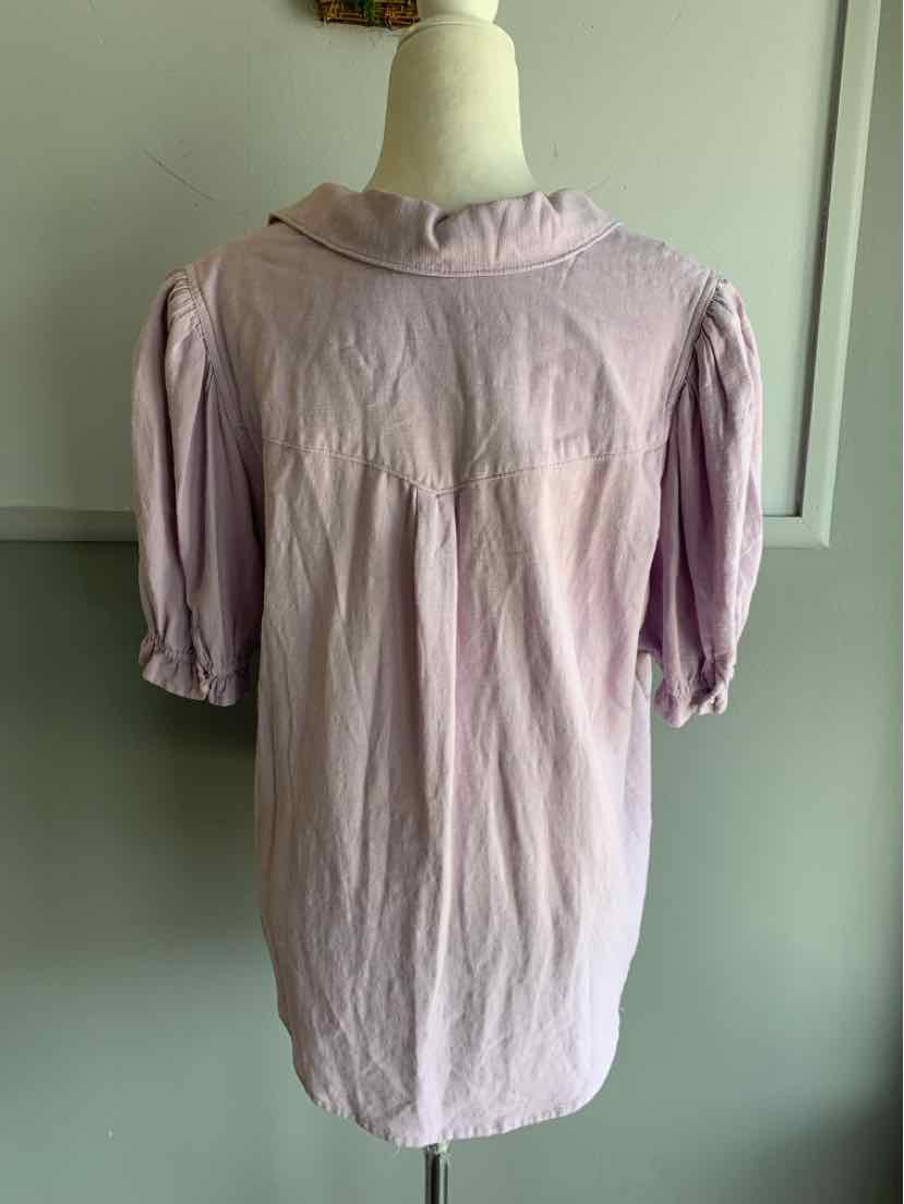 Light purple blouse with puffed short sleeves and soft fabric draped back collar.