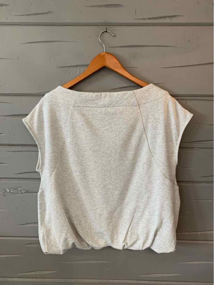 Light gray short-sleeve women's top with wide neckline and gathered hem, size large.