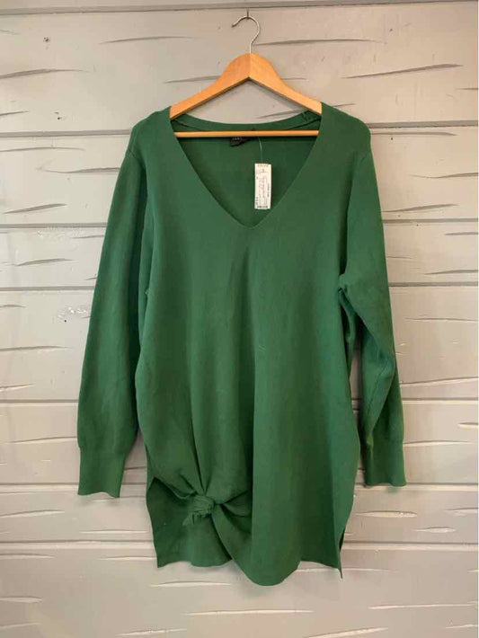 Green long-sleeve V-neck sweater with side knot detail, size 2X, hanging on wooden hanger.