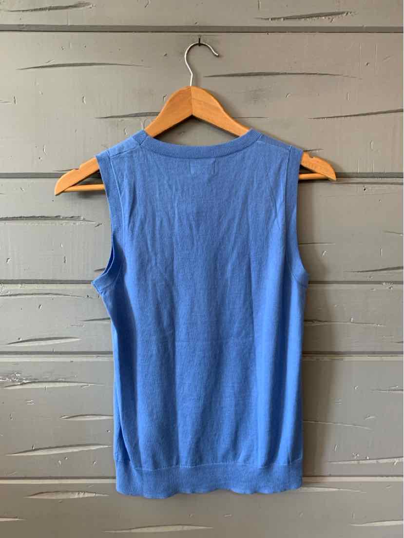 Light blue sleeveless knit top with round neckline and ribbed hem, displayed on wooden hanger.