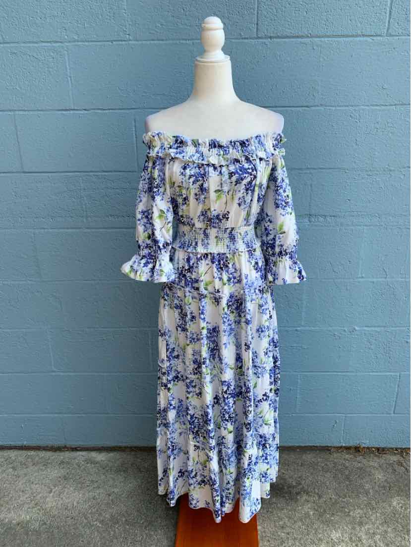 Blue and white floral off-shoulder midi dress with 3/4 puff sleeves and ruffled hem.