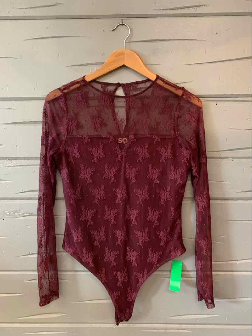 Long-sleeve burgundy lace bodysuit with solid lining on torso and sheer sleeves, keyhole back detail.
