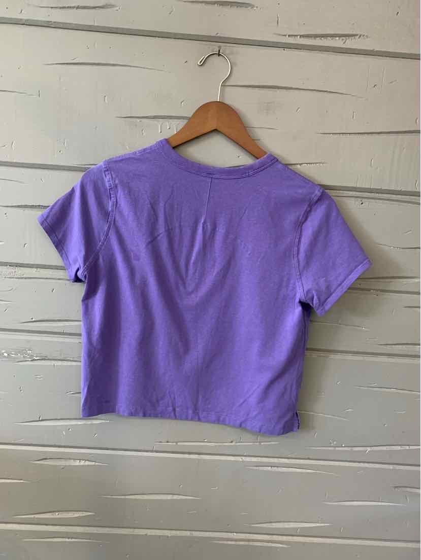Purple cropped short-sleeve t-shirt with crew neckline, soft fabric, and relaxed fit.