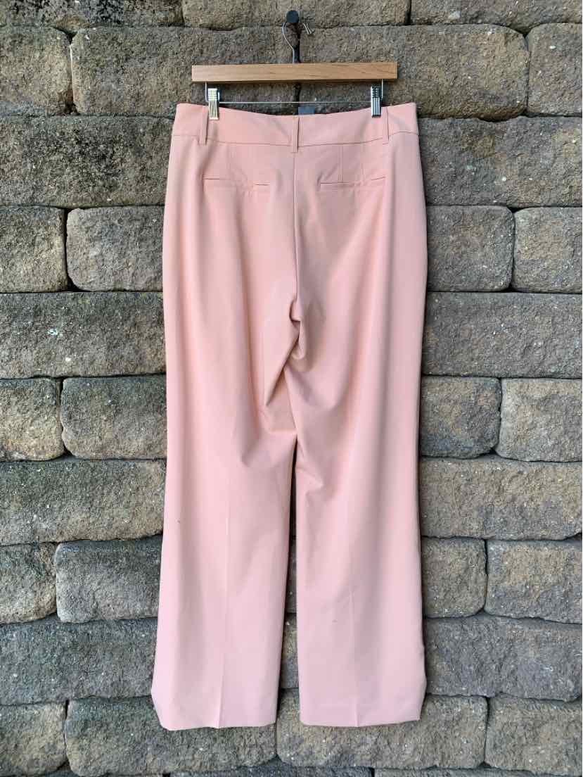 Light pink straight-leg pants with a smooth, solid fabric and a mid-rise waist.