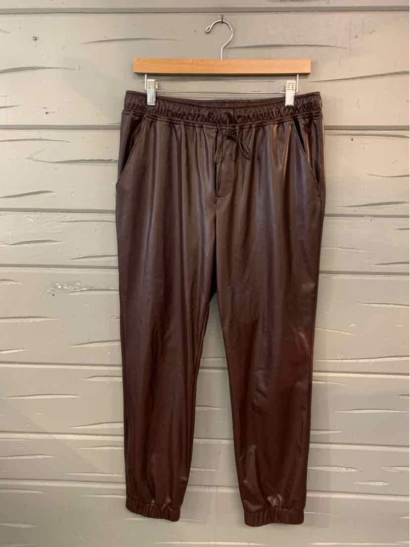 Brown faux leather jogger pants with elastic waistband and cuffs, medium size.