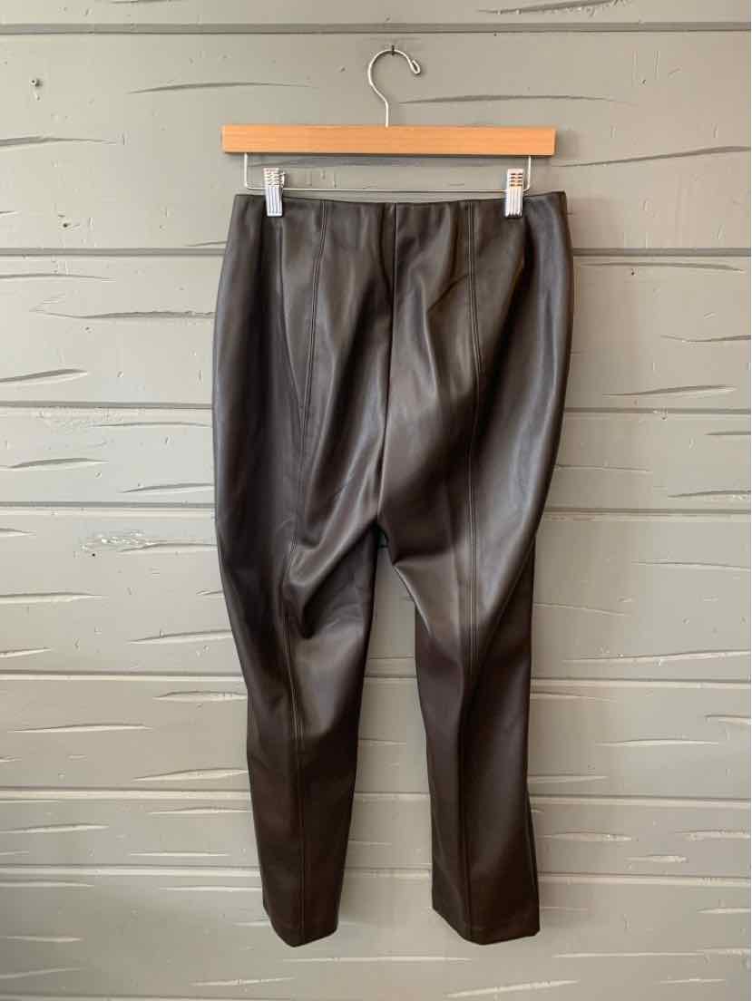 Black faux leather tapered pants with a high waist and pleated front detail.