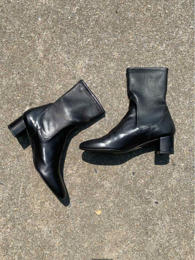 Pair of women's black leather ankle boots with block heels and rounded toes, size 9.5.