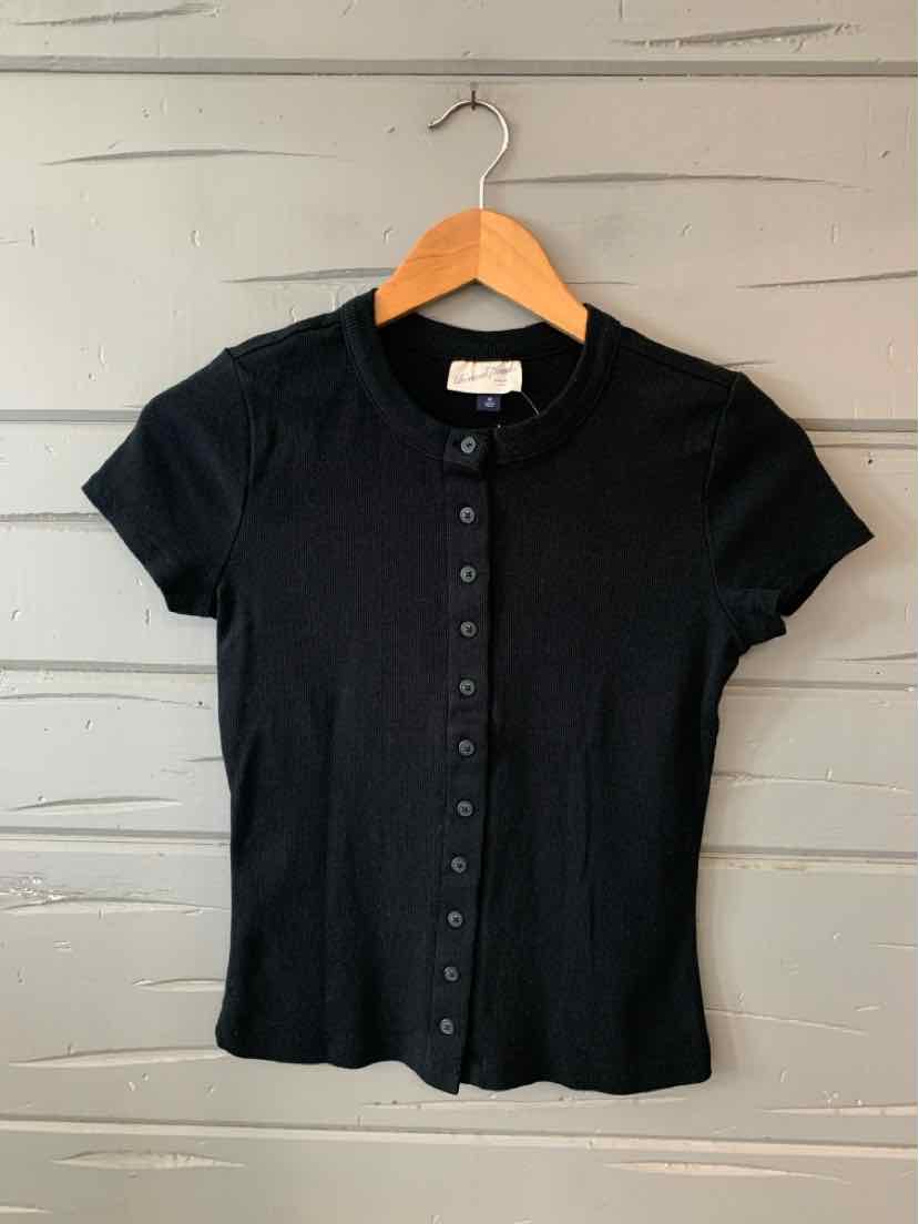 Black short-sleeve ribbed knit top with button-down front and round neckline.