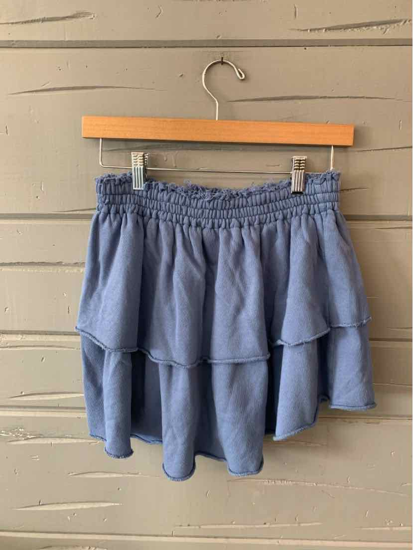 Blue tiered mini skirt with elastic waistband, soft flowy fabric, casual style.
