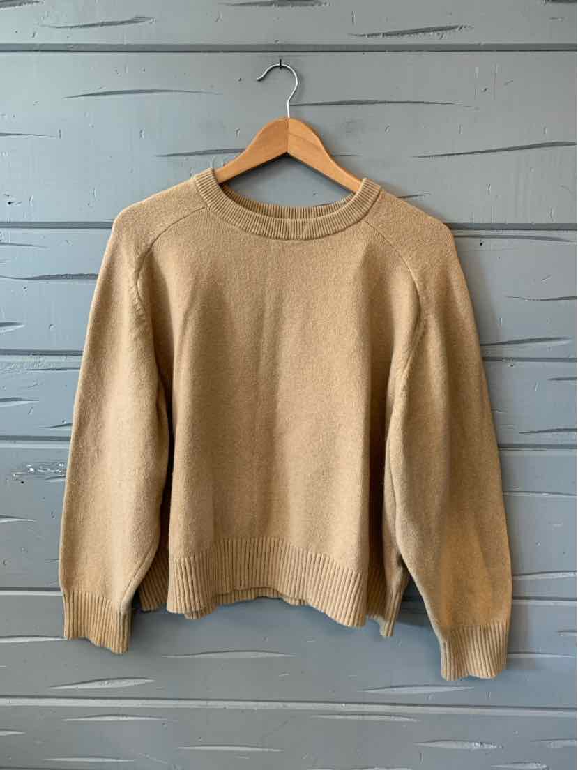 Tan crewneck sweater with long sleeves and ribbed cuffs, hem, and neckline, size XXL.